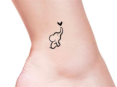 feminine elephant tattoos|cute elephant tattoos for women.